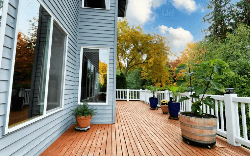 white-railings-long-stained-wood-deck_result